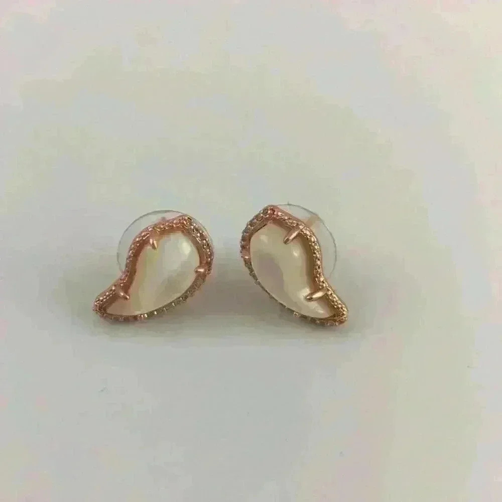 Kendra Scott new Temple in Ivory/blush gold